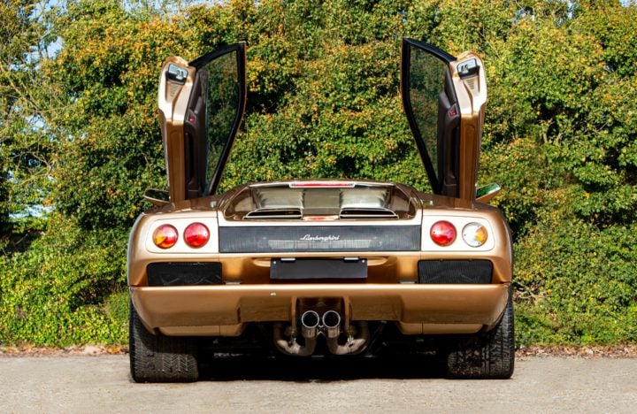 lambo-diablo-2-720x468-1 Lamborghini Diablo VT rear with open gullwing doors